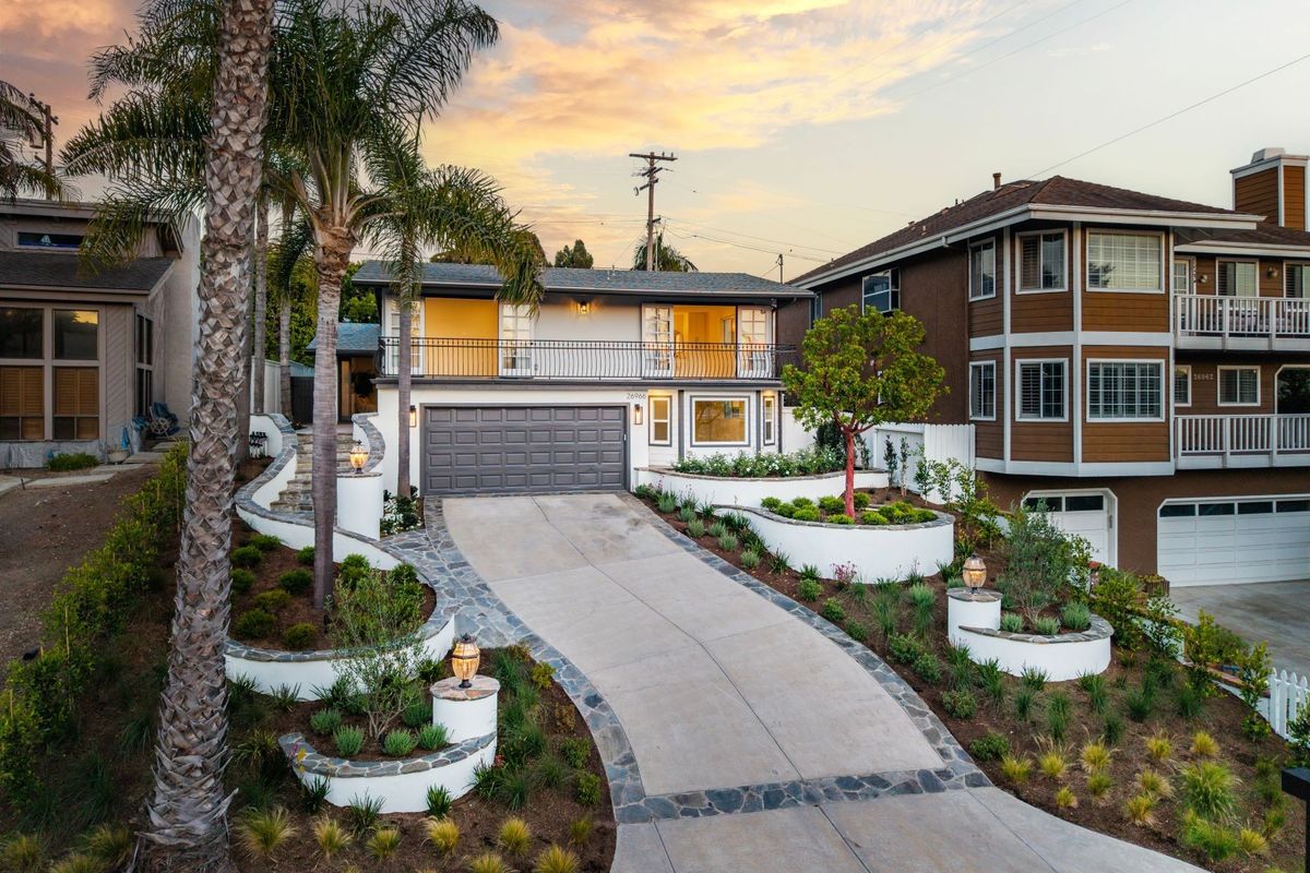 Front elevation of 26966 Calle Dolores at twilight